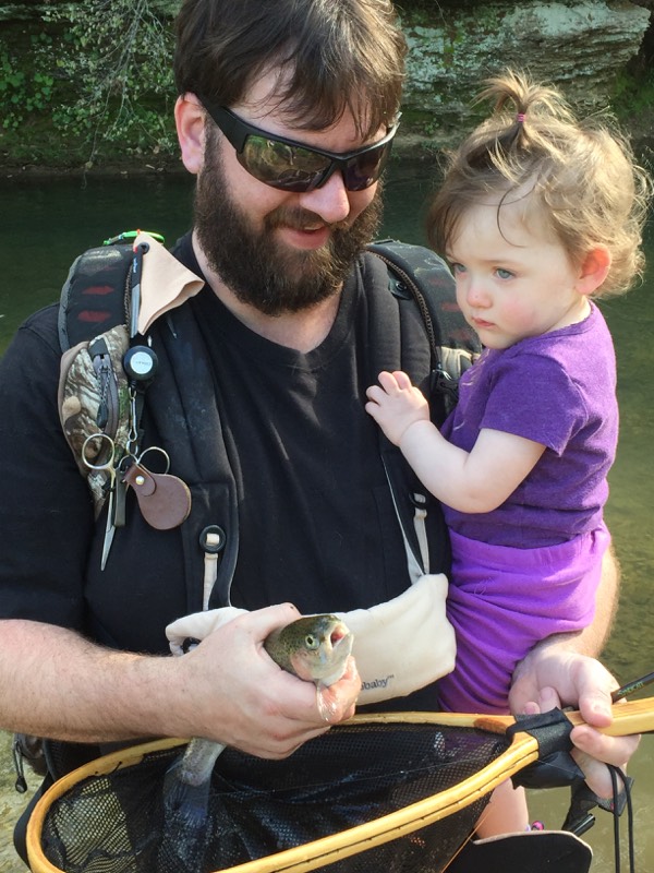 alana trout Man and child with trout.