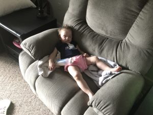 Alana sleeping on the couch.