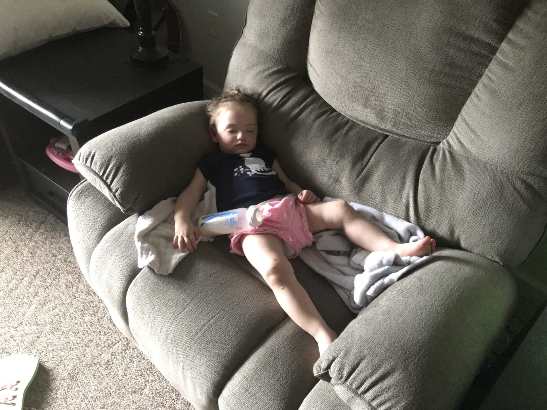 Alana sleeping on the couch.