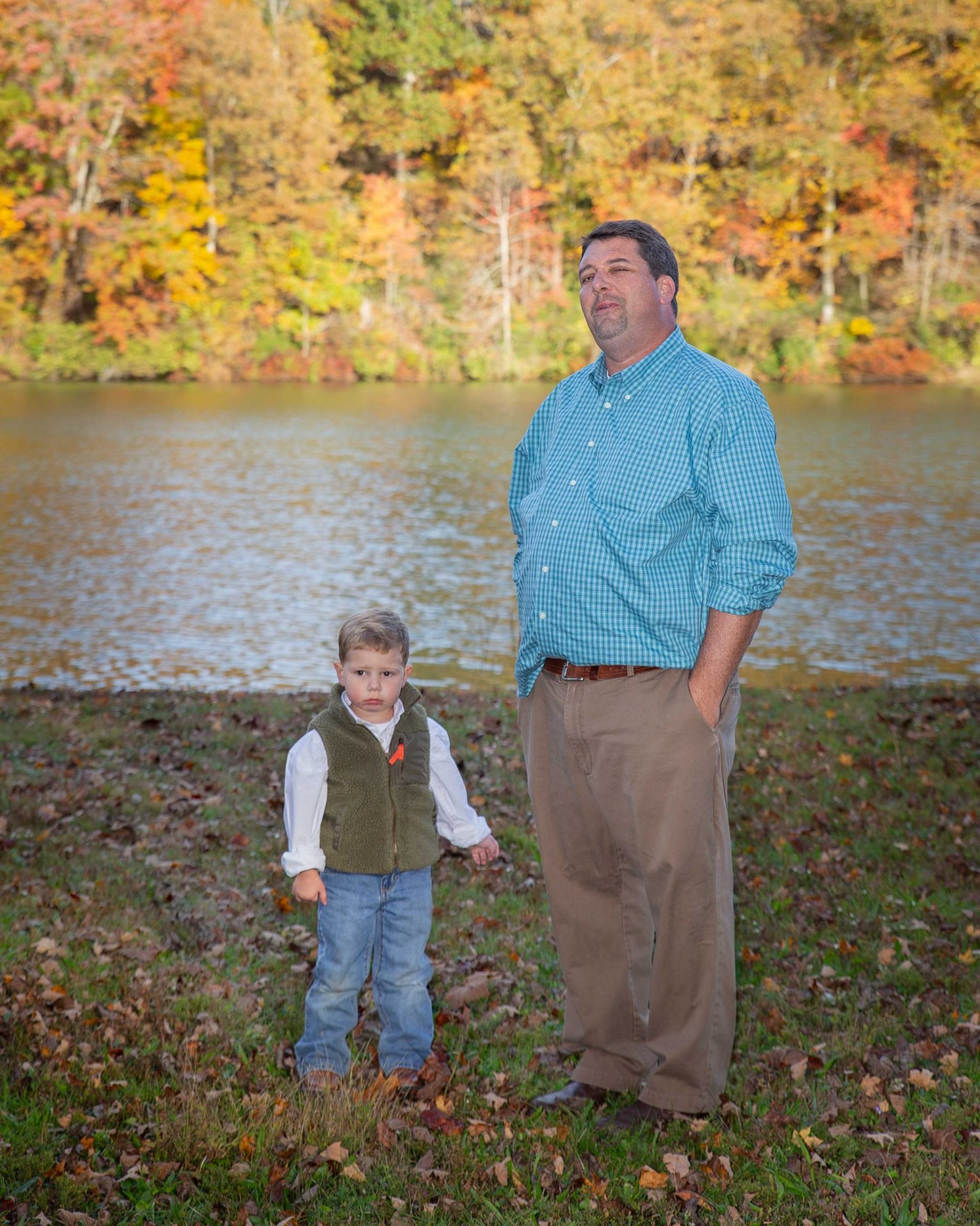 josh an dave Man and son getting photo in park.