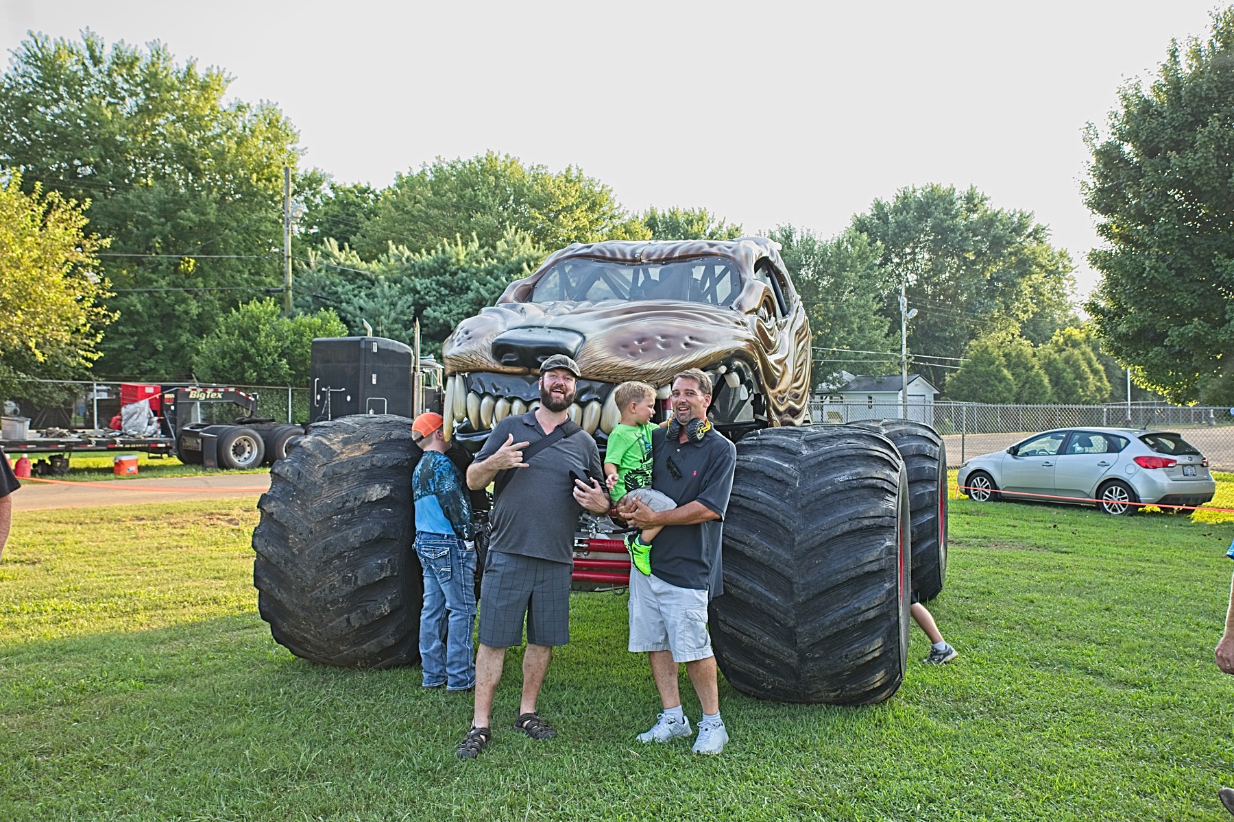 visit lawrenceburg tn 07272019 Two guys in front of monster truck.