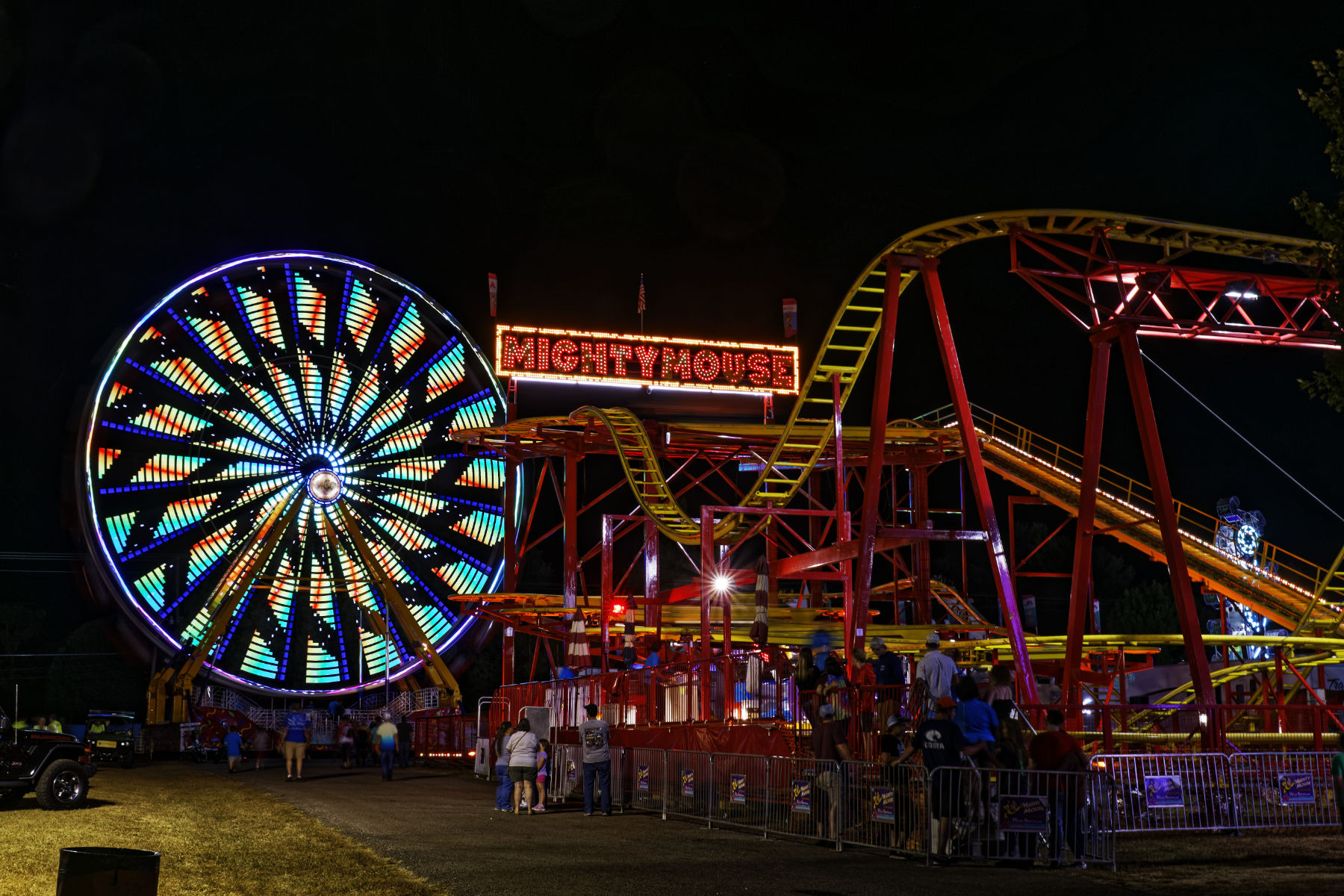 visit lawrenceburg tn fair 2019 farris wheel and ride A local town fair with it's neon lights.