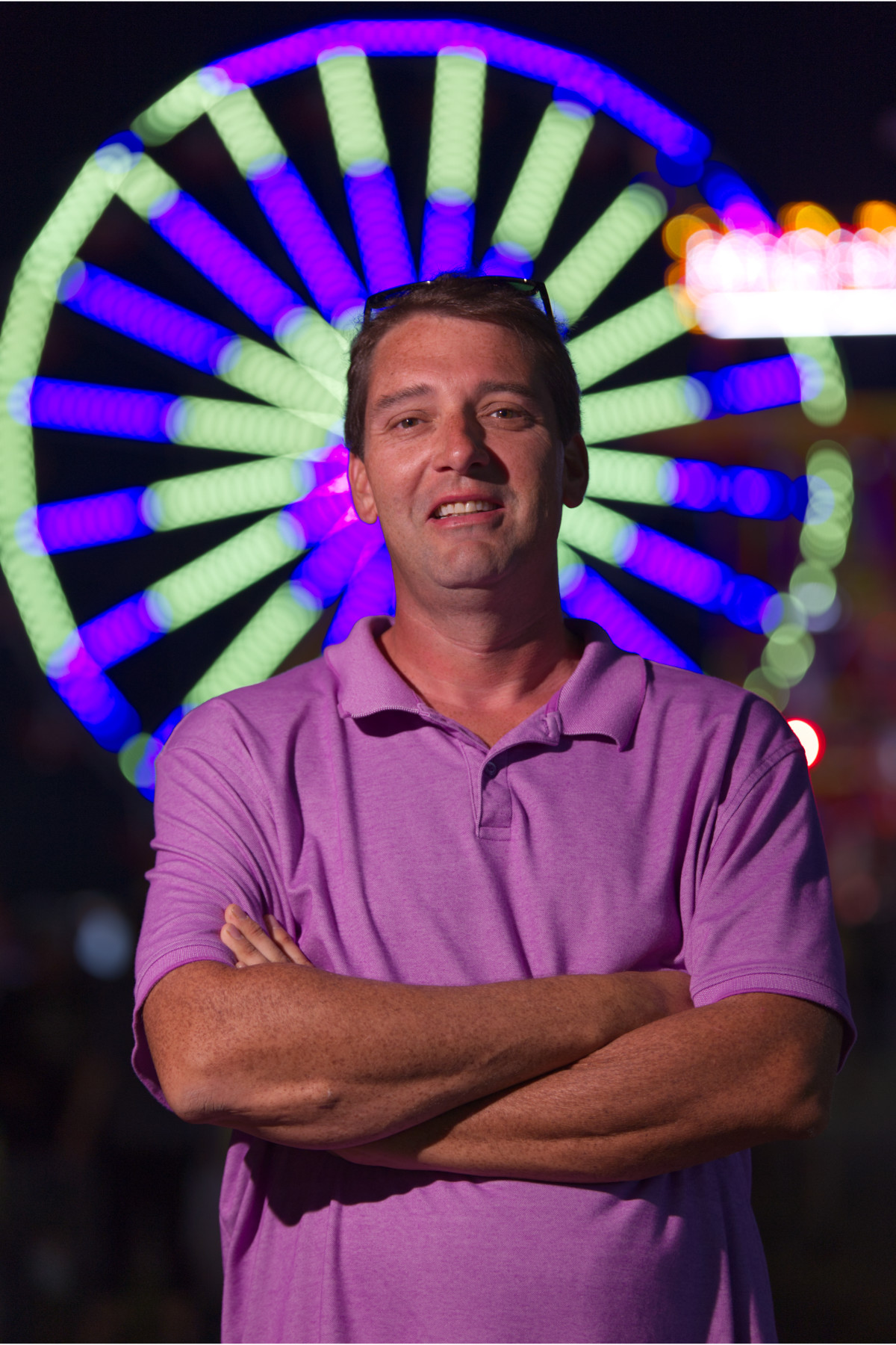visit lawrenceburg tn josh at fair 2019 Guy in front of ferris wheel.